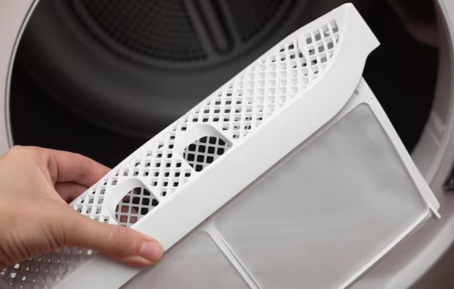 Limpeza de filtro de fiapos de secadora de roupas para melhor performance